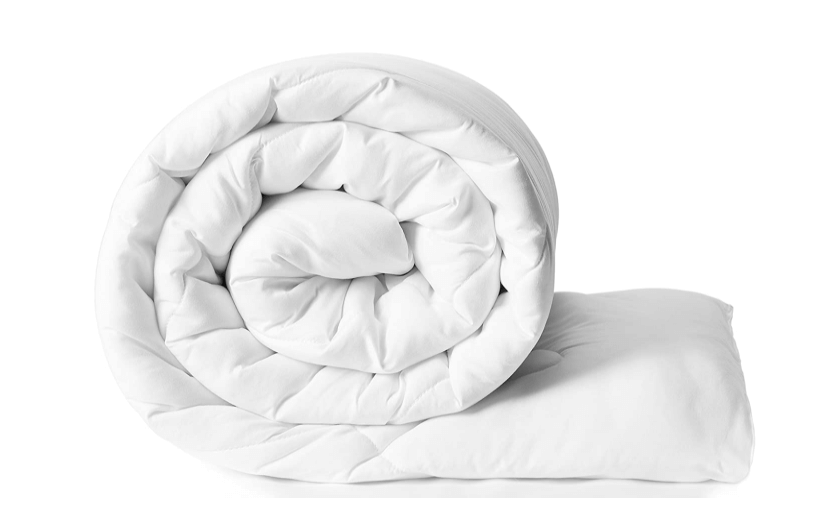 Soothing white comforter as Christmas gift idea for women.